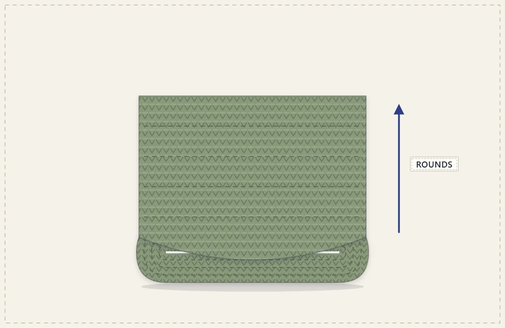 The bag sides rising straight up from the oval base in rounds
