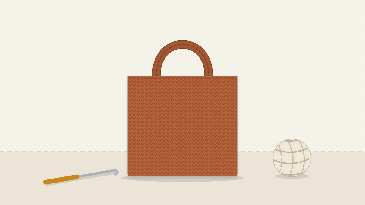 A plain rectangular single-crochet bag with two short handles in a warm clay color