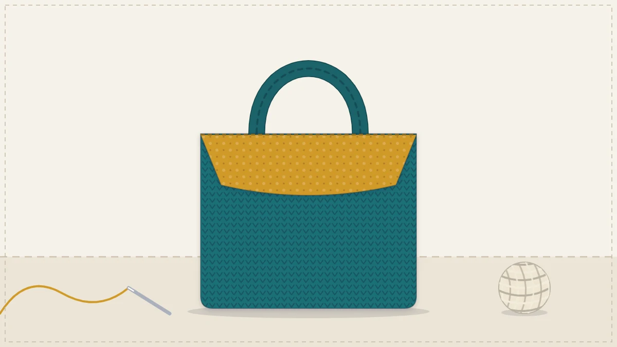 A crocheted tote with its top edge turned back to show a patterned cotton fabric lining inside